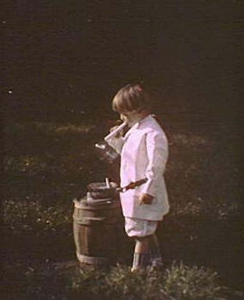 Young Boy Blowing Bubbles, c. 1906